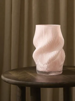 Grooved and twisted light pink vase