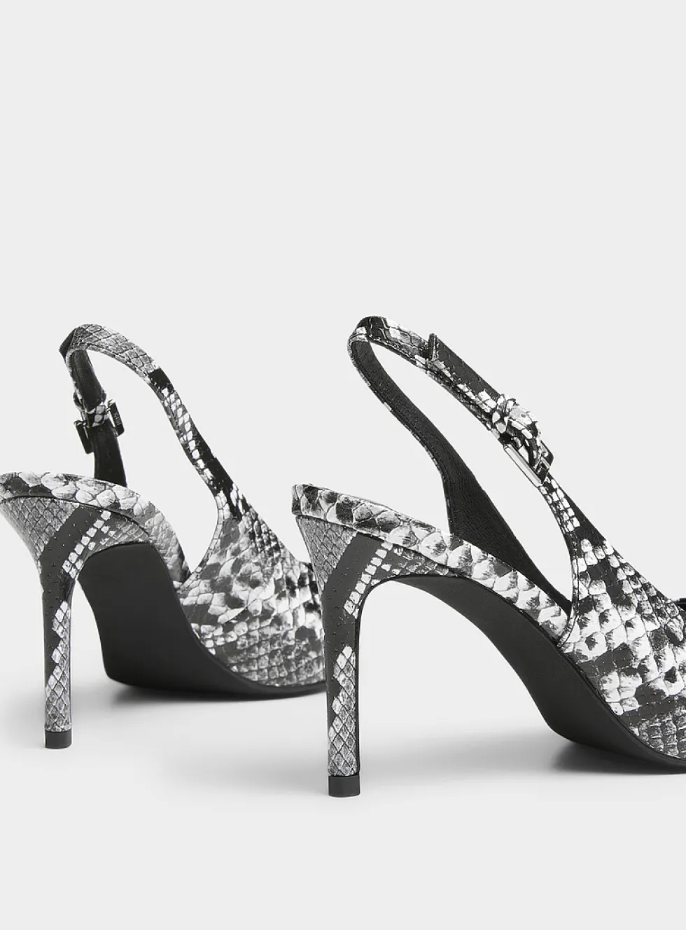 Kienna snakeskin leather slingback pumps