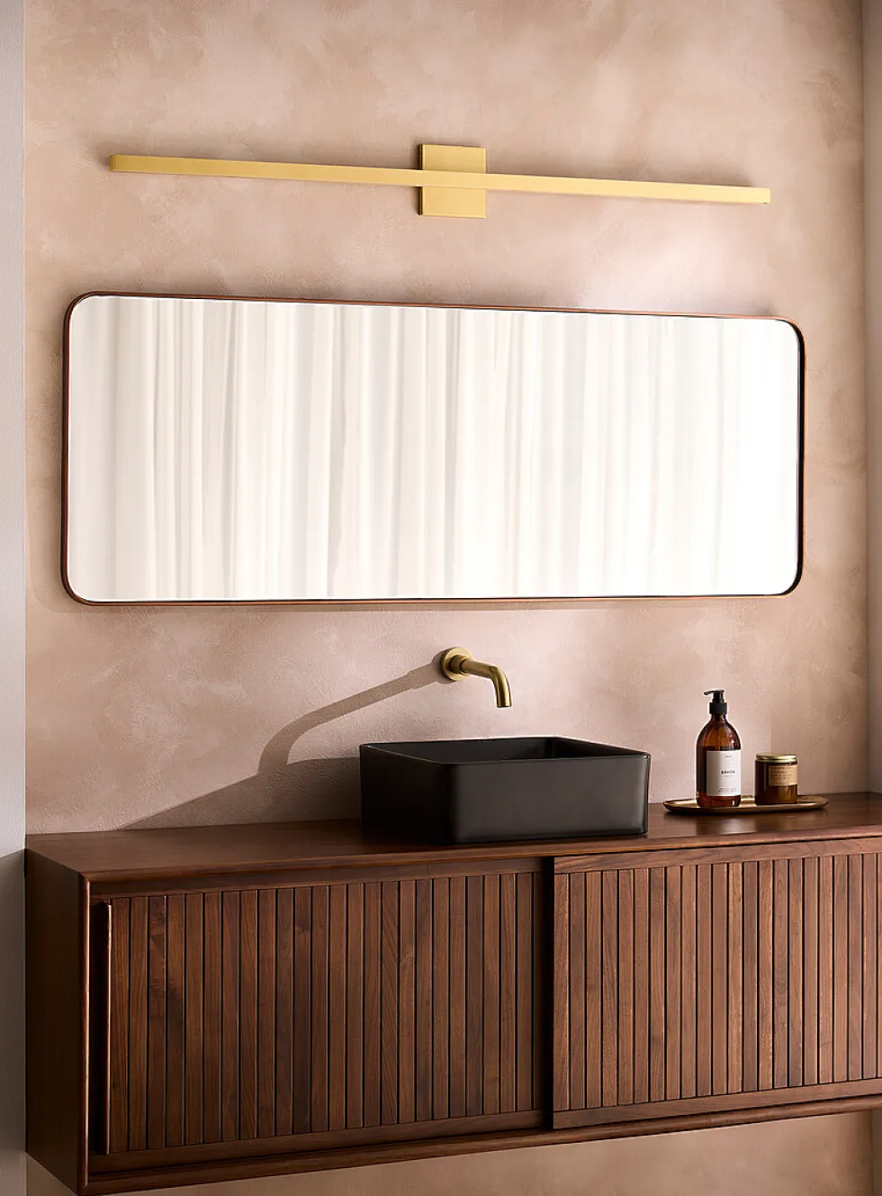 Large slender golden sconce