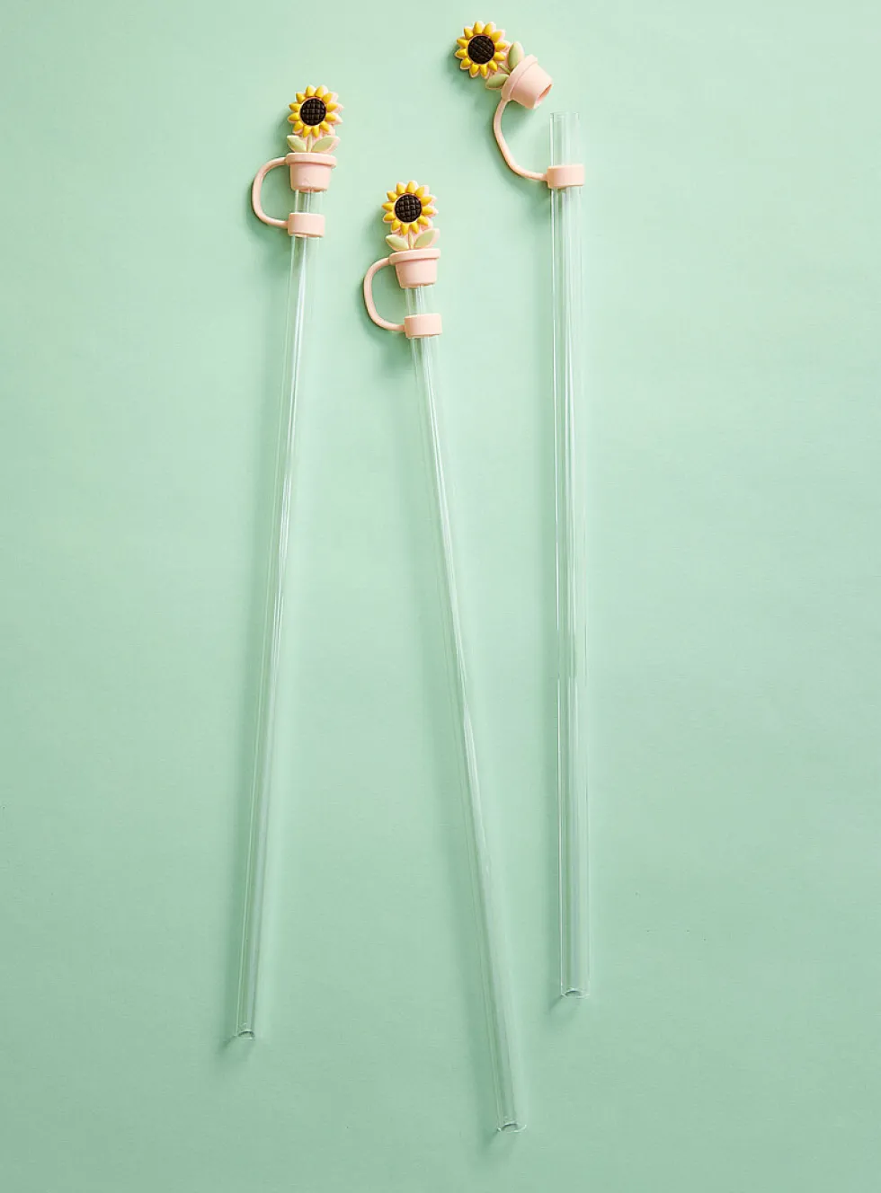 Large transparent straws with playful stoppers