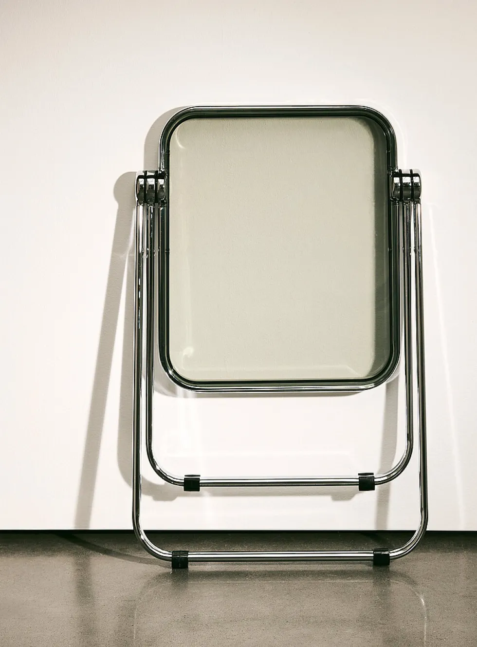 Metal and polyethylene folding accent table