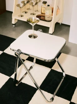 Metal and polyethylene folding accent table