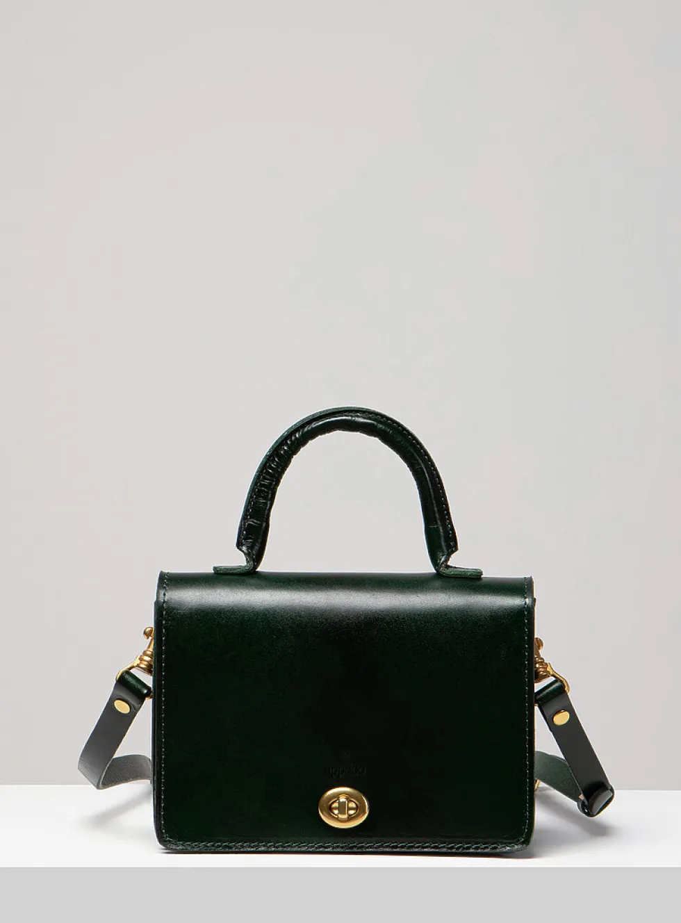Minimalist Turn-loc closure handbag