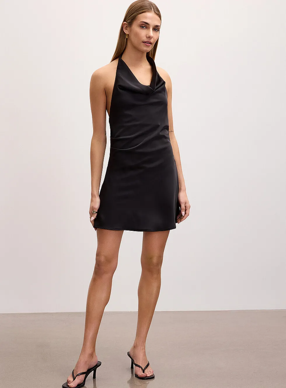 Open-back halter neckline satiny minidress
