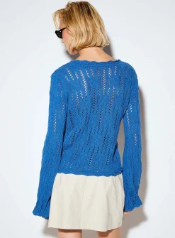 Openwork knit tie-up cuffs sweater