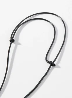 Oval pendant wrap cord choker