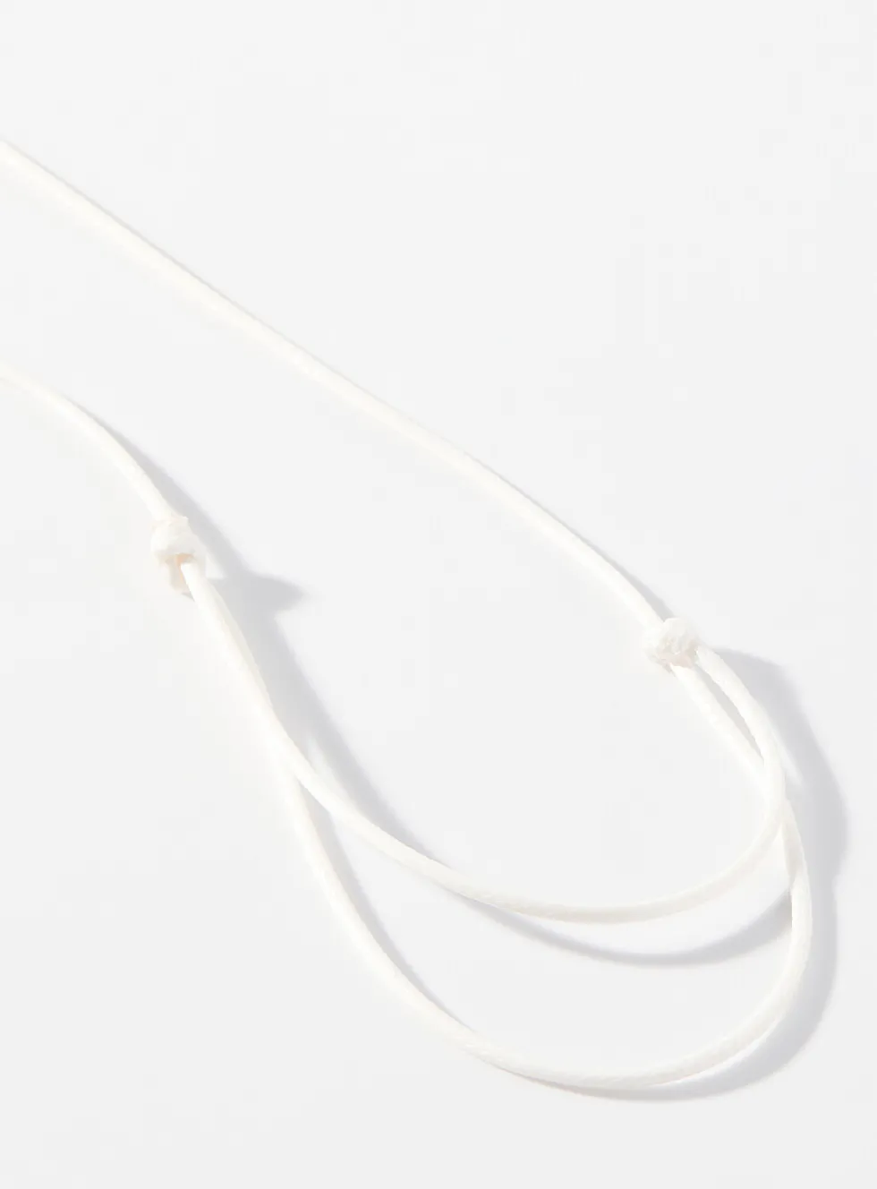 Oval pendant wrap cord choker