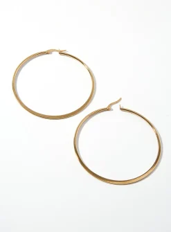 Oversized golden hoops