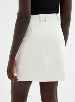Piped pockets structured skort