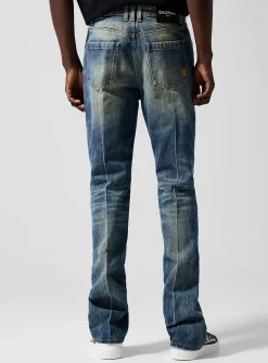 Pleated faded fitted jean