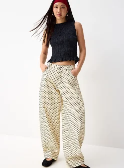 Polka-dotted barrel-leg jean