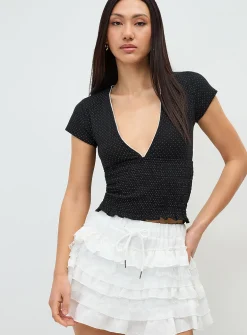 Polka-dotted smocked V-neck T-shirt