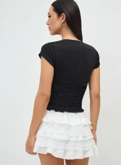Polka-dotted smocked V-neck T-shirt