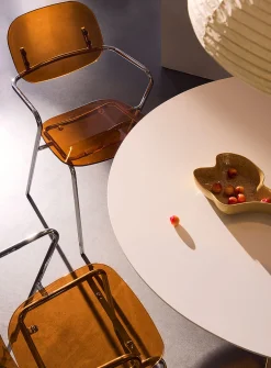 Polycarbonate and metal armrest chairs