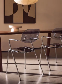 Polycarbonate and metal armrest chairs