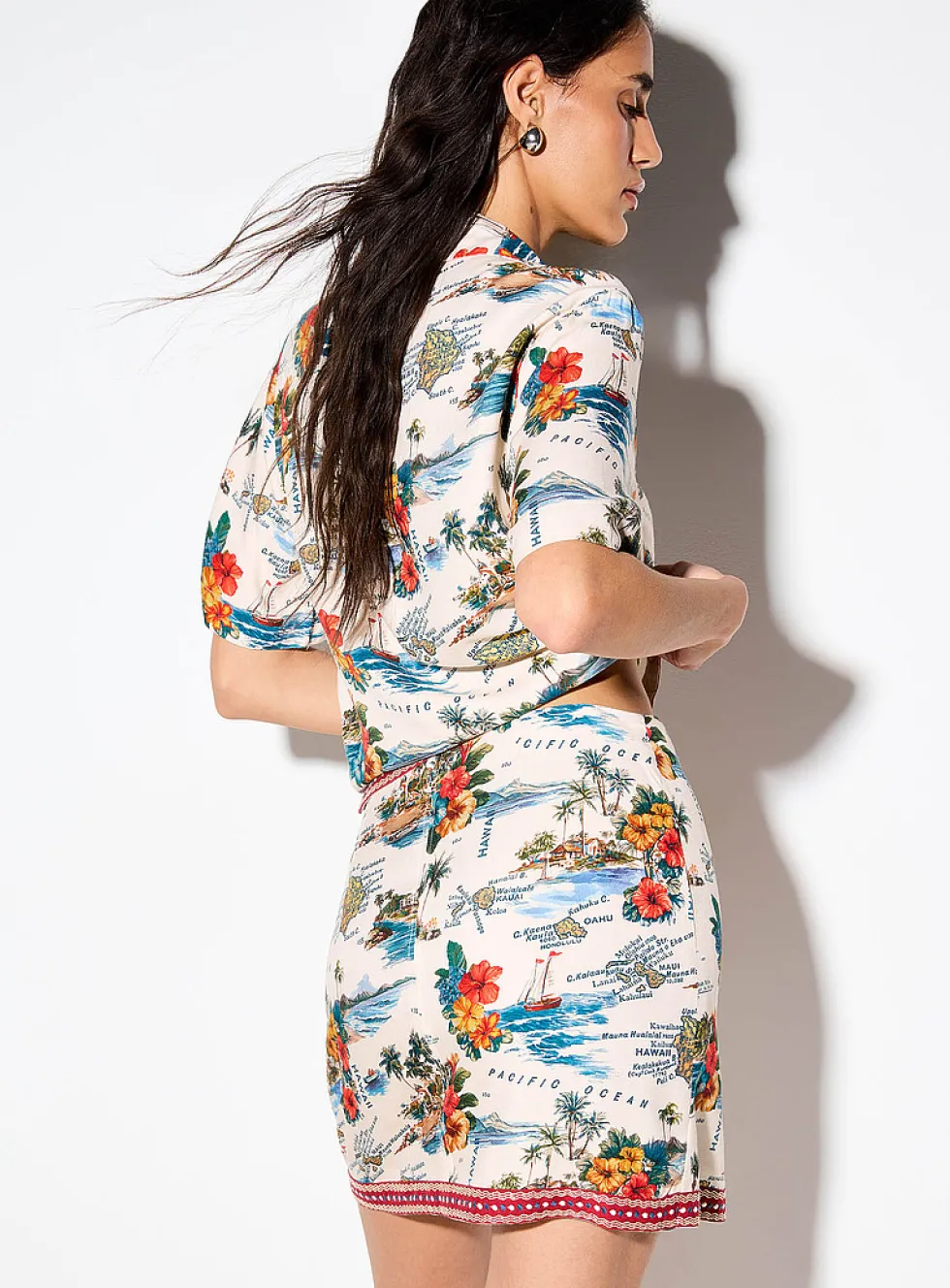 Printed side-tie wrap miniskirt