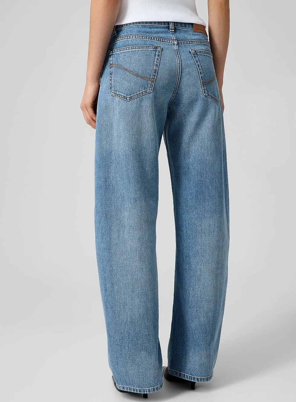 PURE.TECH curved-leg jean