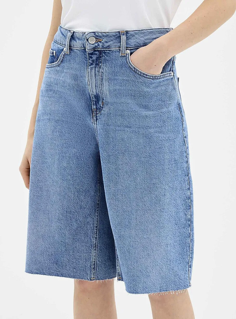 Raw-hem luxurious denim Bermudas