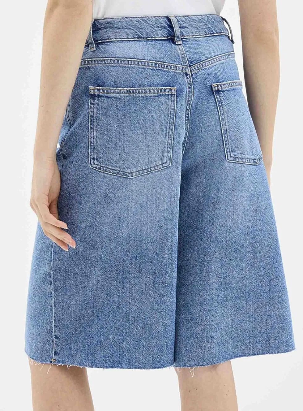 Raw-hem luxurious denim Bermudas