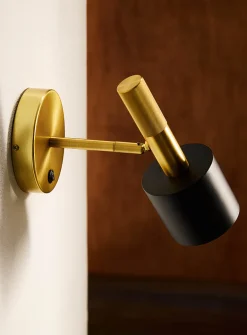 Rhoswen matte black and brass minimalist wall sconce