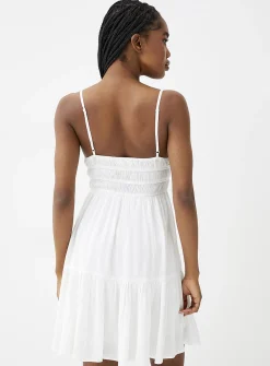Ruching and ruffles dress