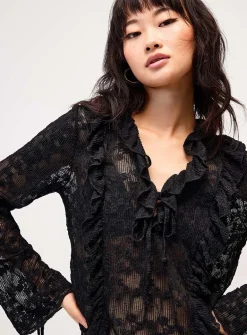Ruffled lace blouse