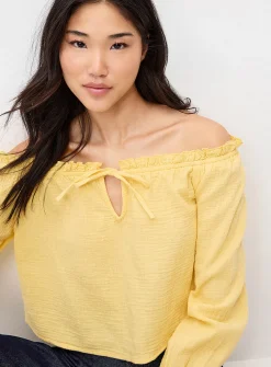 Ruffled off-the-shoulder blouse