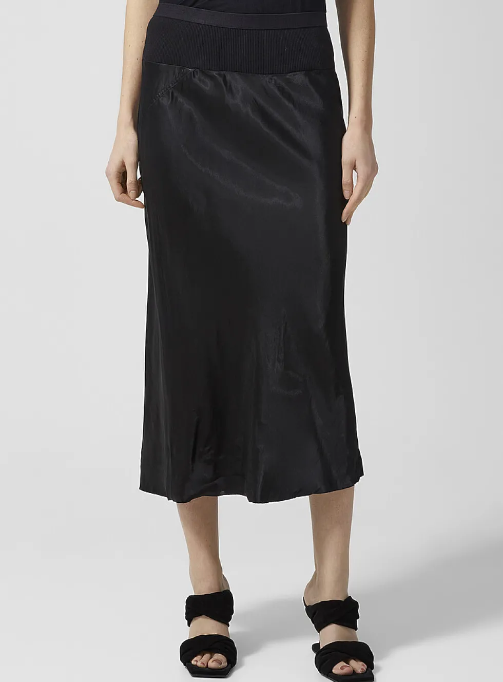 Satiny black pencil skirt