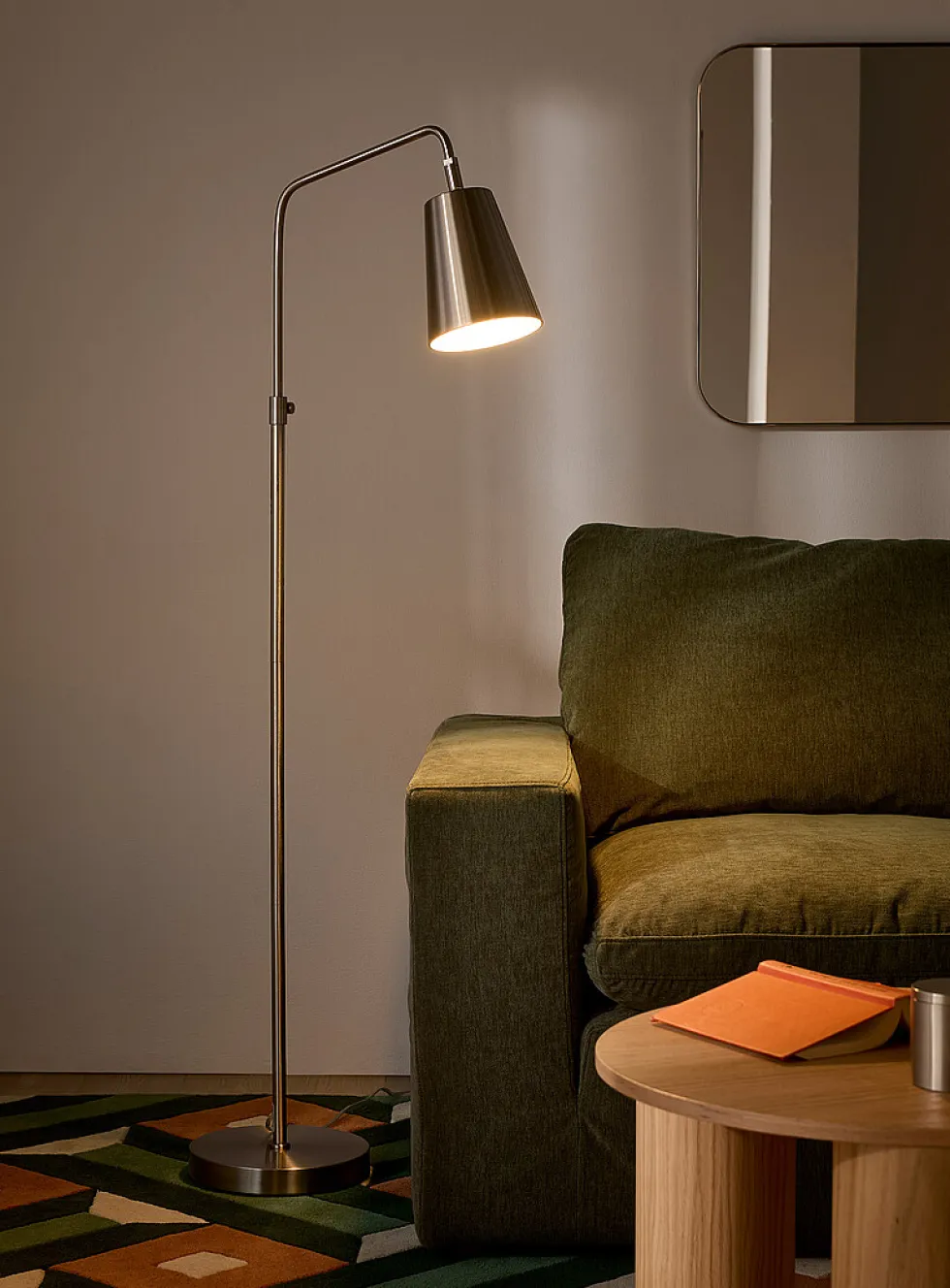Sleek adjustable-height floor lamp