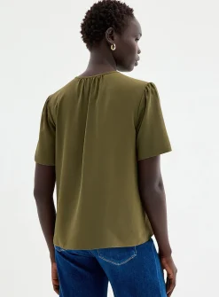 Slit-collar flowy crepe blouse