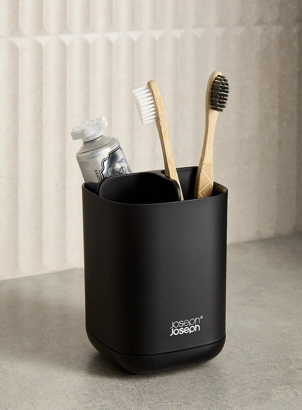 Small black toothbrush holder