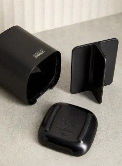 Small black toothbrush holder