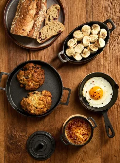 Small cast iron skillet with bamboo tray