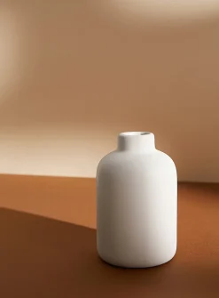 Small minimalist polished ceramic vase