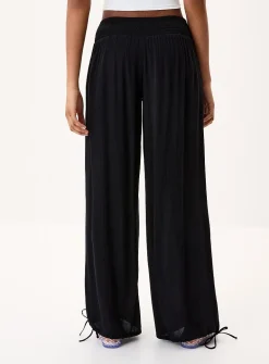 Smocked-waist crinkled-finish pant