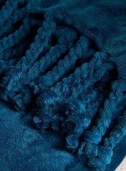 Solid soft plush fringed throw