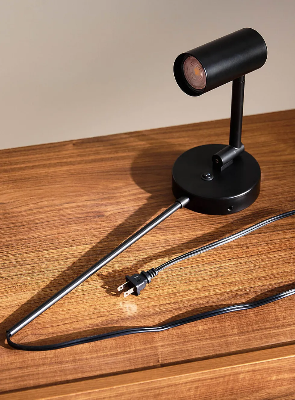Stanly articulated arm matte black single-beam light fixture