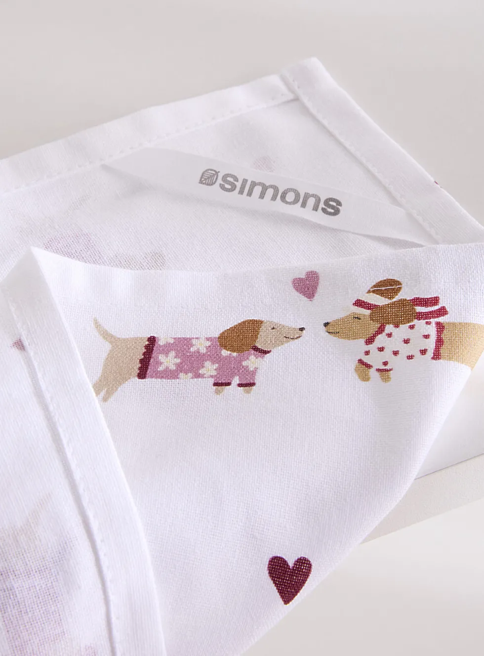 Stylized dachshunds tea towel