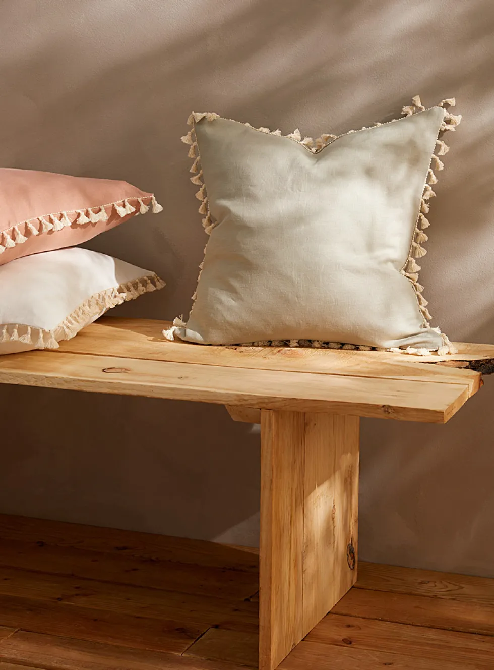 Tasselled linen cushion cover