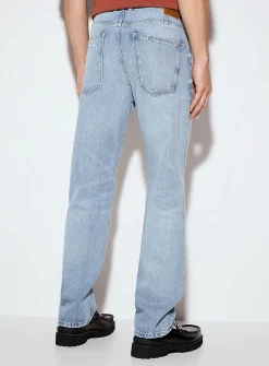 Worn faded blue jean